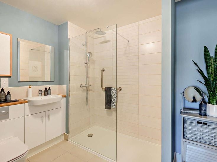 a bathroom with a glass shower