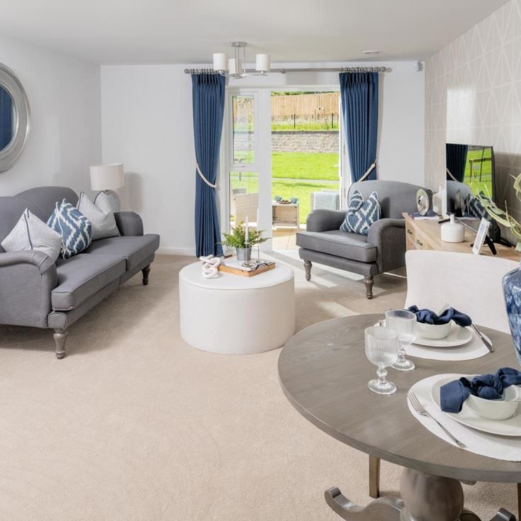 a living room with a couch and a table