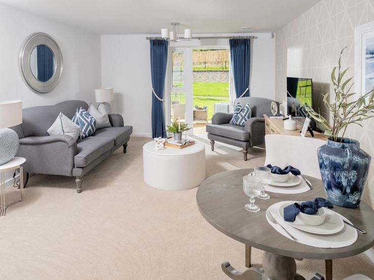 a living room with a couch and a table