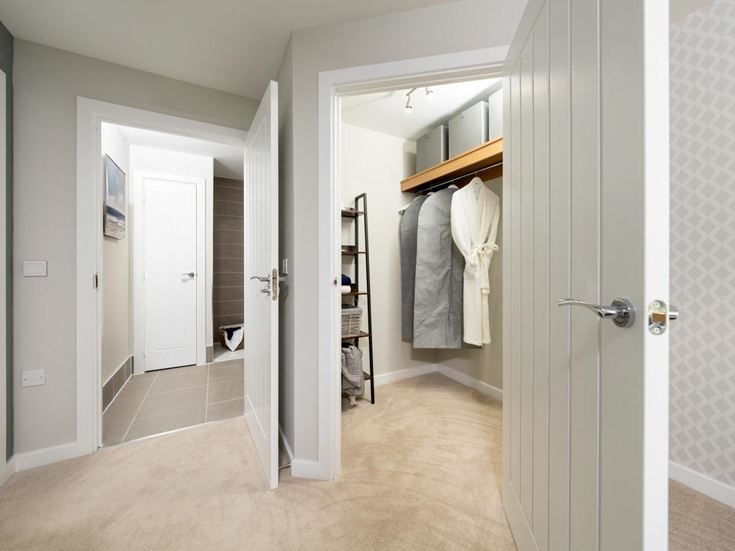 a bathroom with white walls