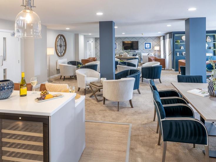 a room with tables and chairs