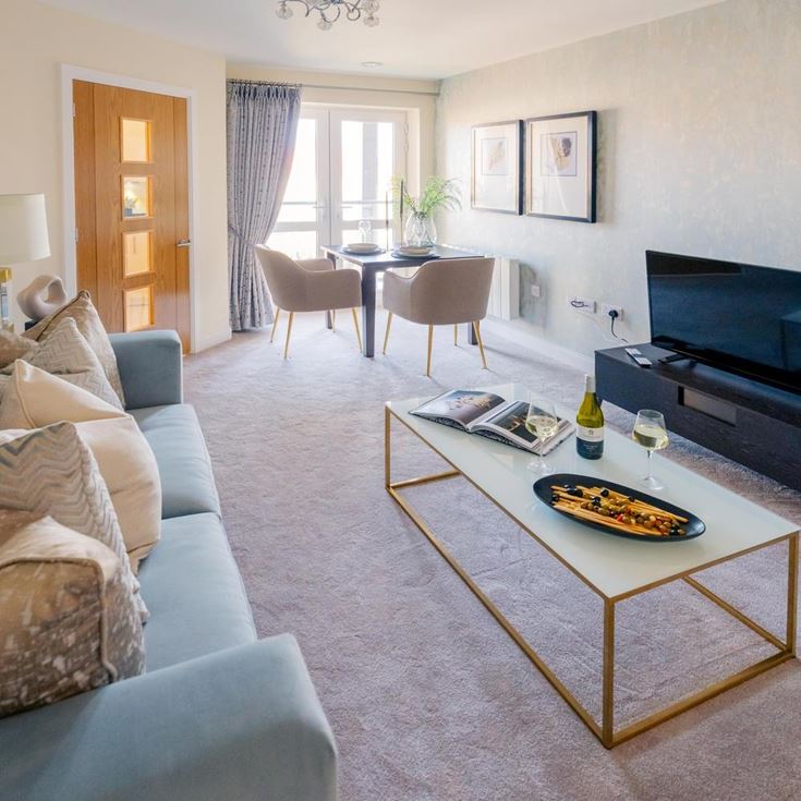 a living room with a fireplace
