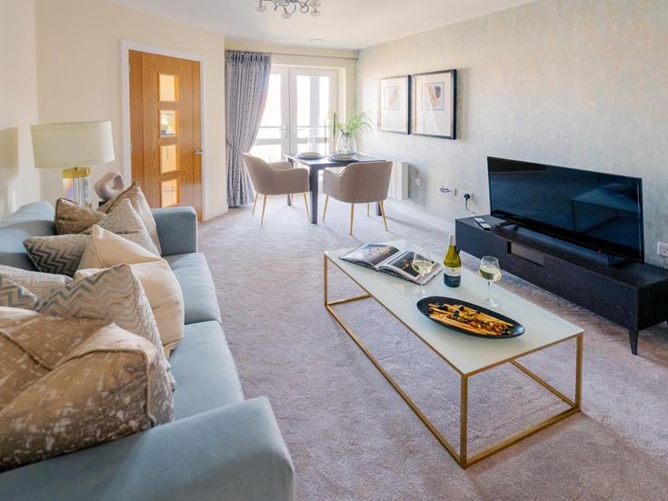 a living room with a fireplace