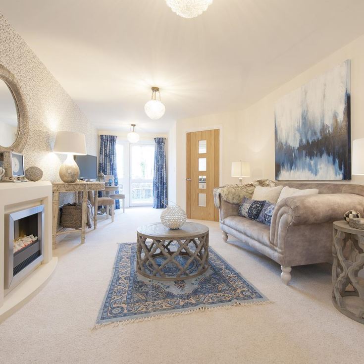 a living room with a fireplace