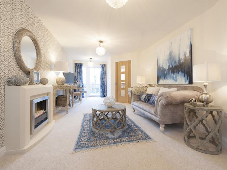 a living room with a fireplace
