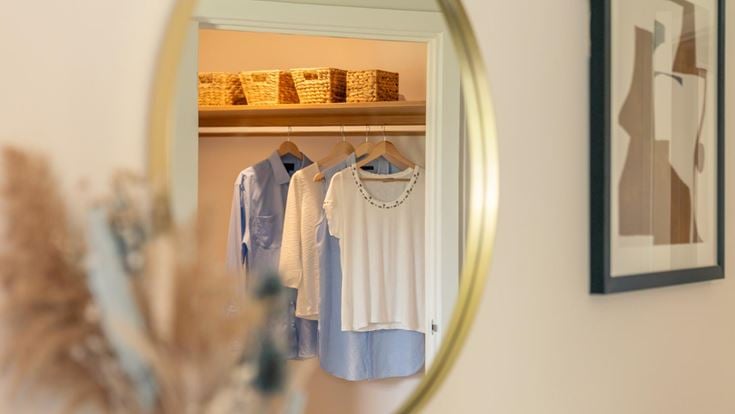 a mirror with clothes