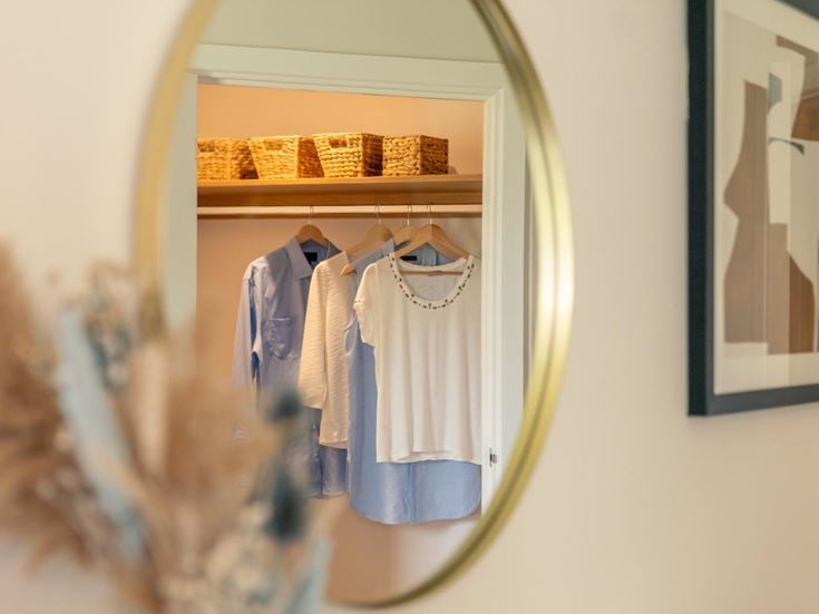 a mirror with clothes