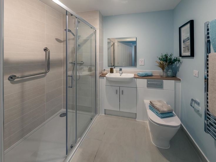 a bathroom with a glass shower