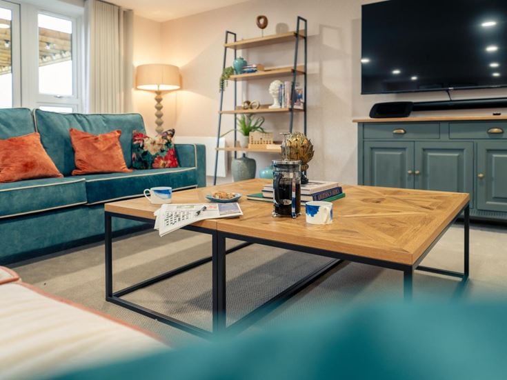 a living room with a couch and coffee table