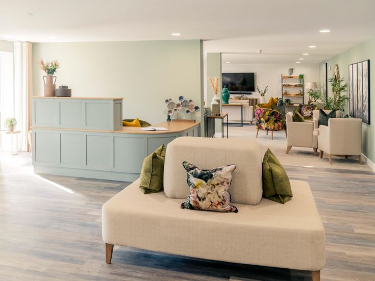 a living room with a white couch