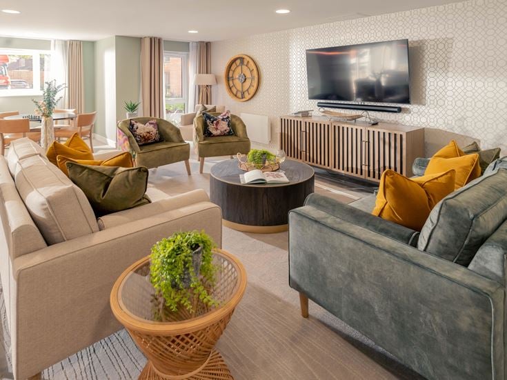a living room with a couch and a television