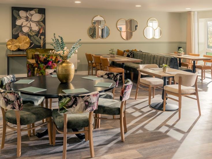 a room with tables and chairs