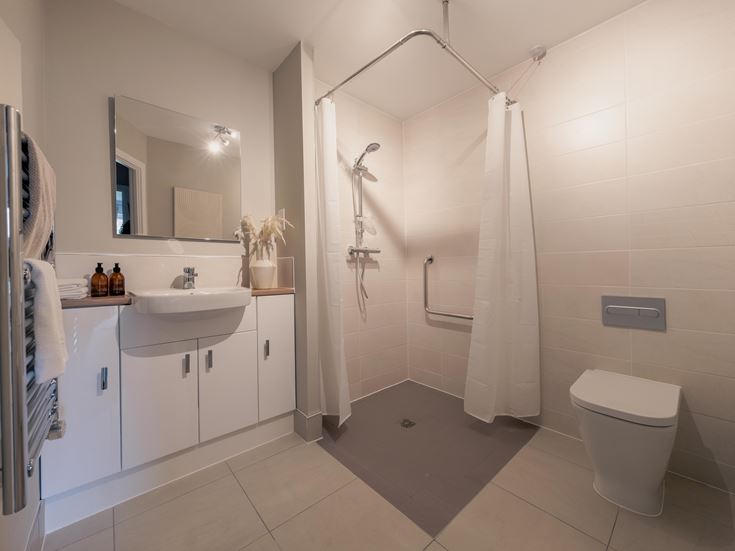 a bathroom with a toilet and sink