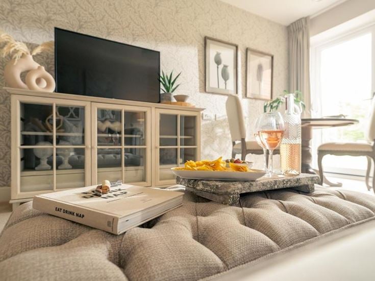 a living room with a tv and a couch