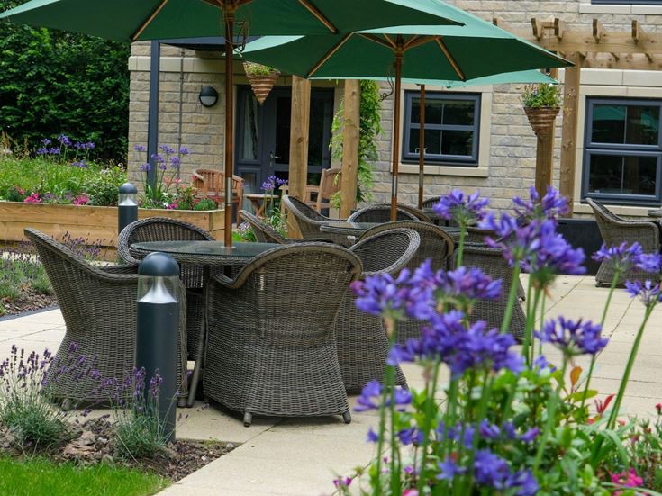 a table and chairs outside