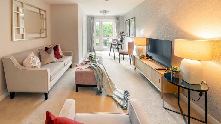 a living room with a couch and a television