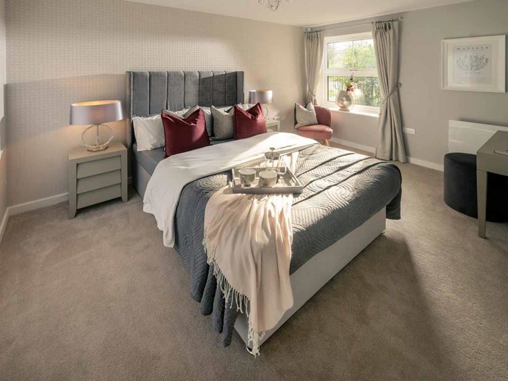 a large bedroom with a large bed