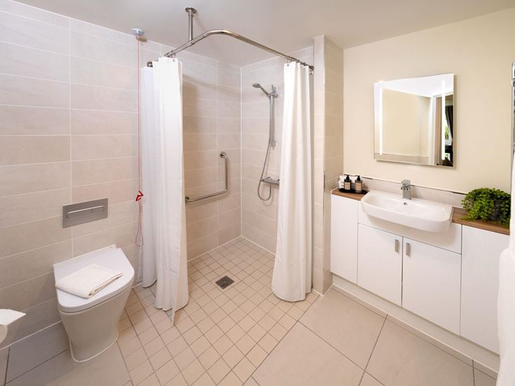 a bathroom with a standup shower