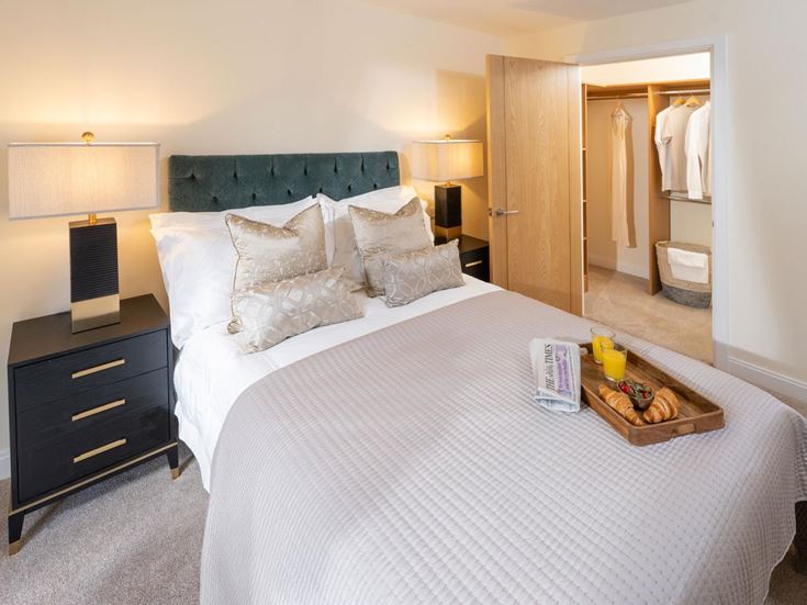 a bed with white sheets