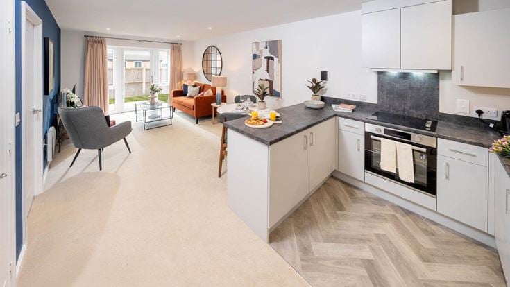 a kitchen with white cabinets