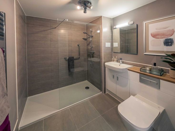 a bathroom with a glass shower