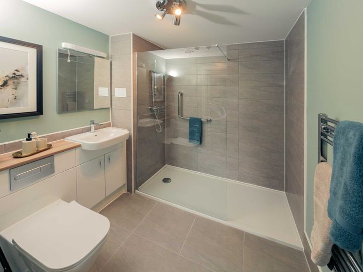 a bathroom with a glass shower