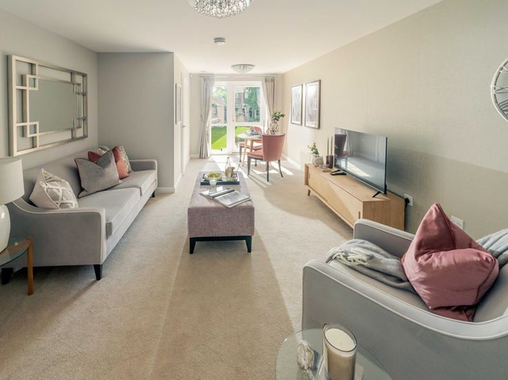 a living room with a couch and a tv