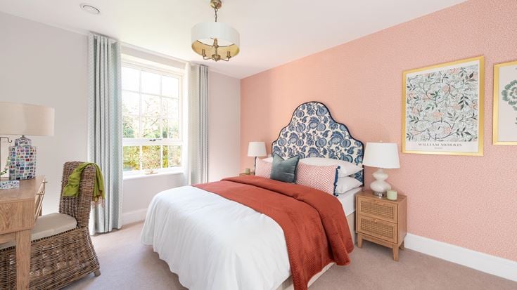 a bedroom with lamps