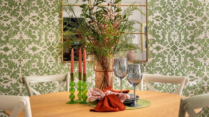 a dining table with flowers
