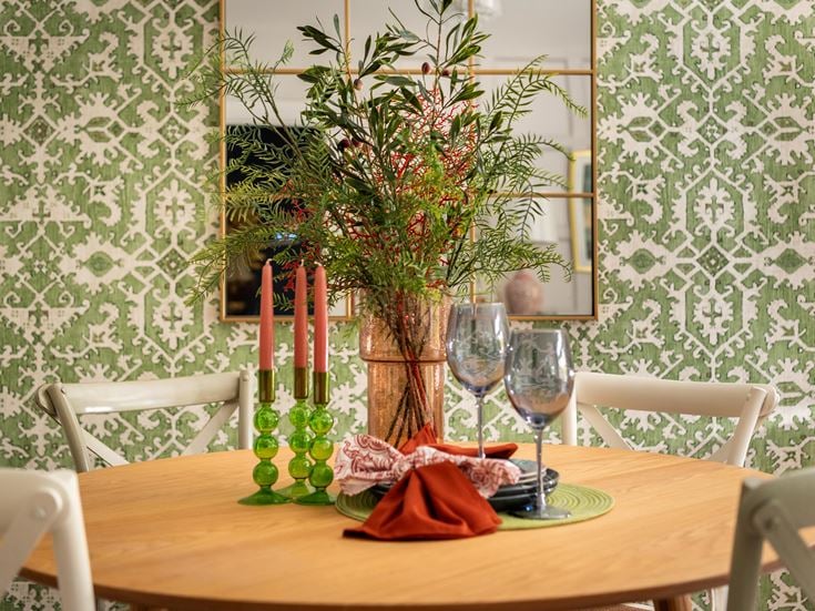 a dining table with flowers