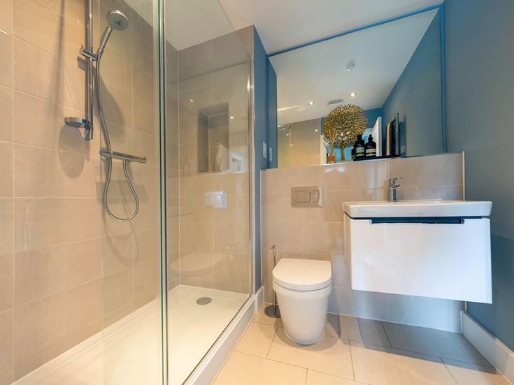 a bathroom with a glass shower