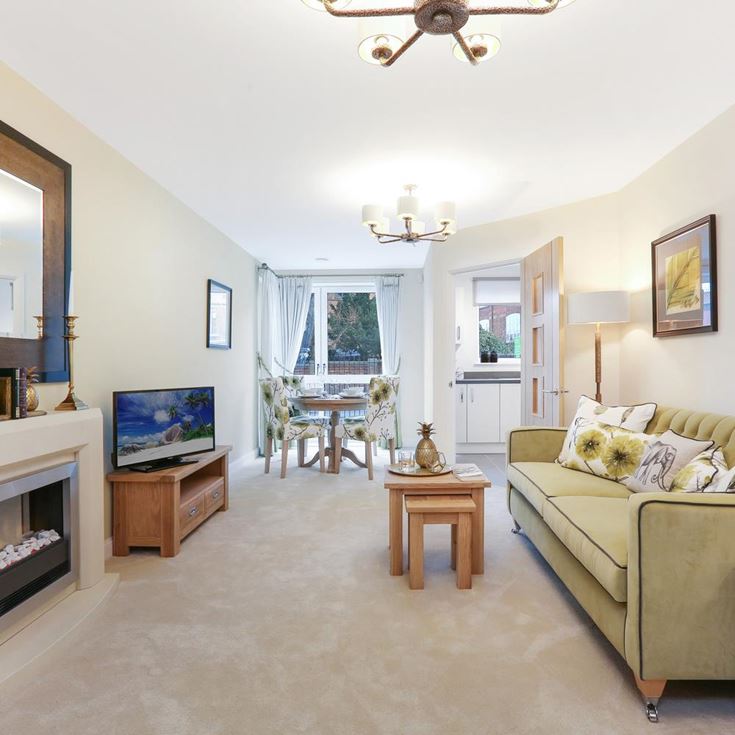 a living room with a fireplace