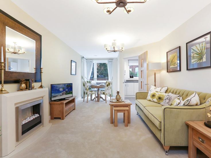 a living room with a fireplace