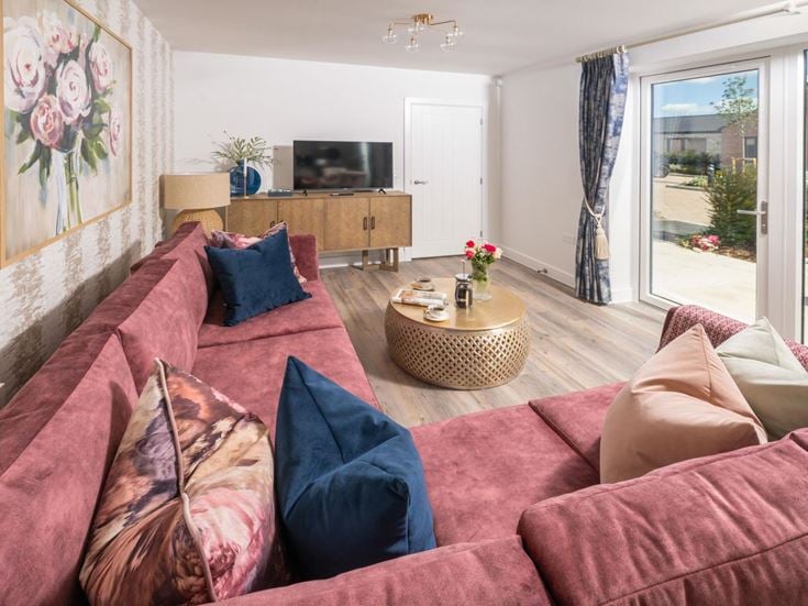 a living room with a couch and a coffee table