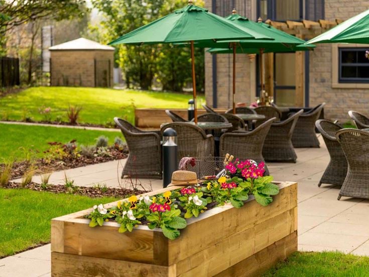 a group of chairs and tables outside