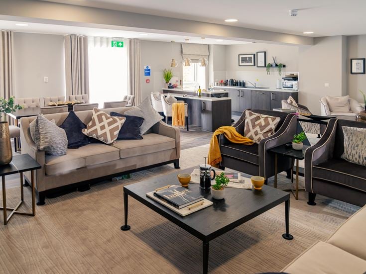 a living room with a couch and a coffee table