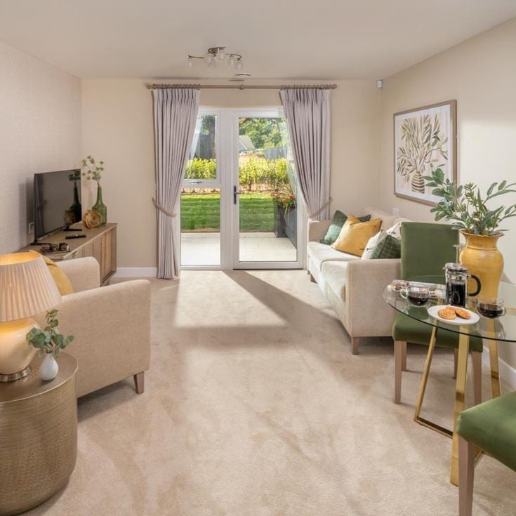 a living room with a large glass door