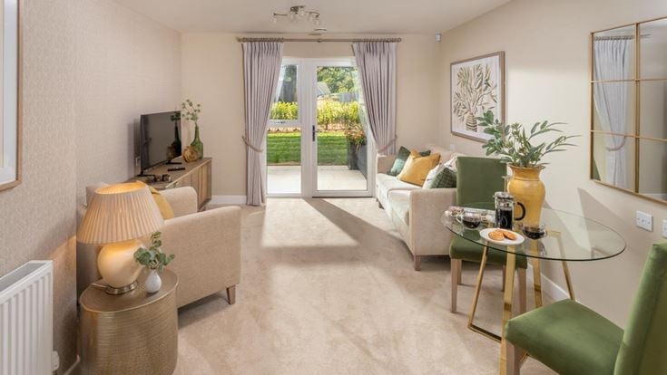 a living room with a large glass door