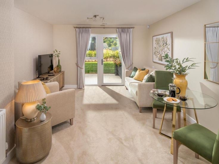 a living room with a large glass door