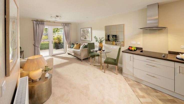 a large living room with a dining table and a couch