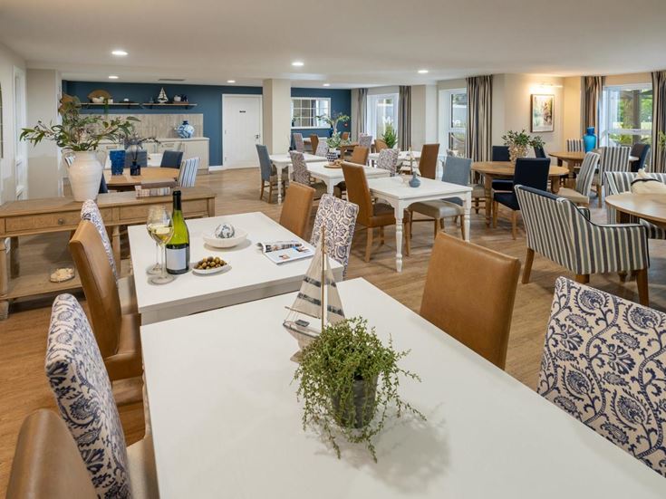 a room with tables and chairs