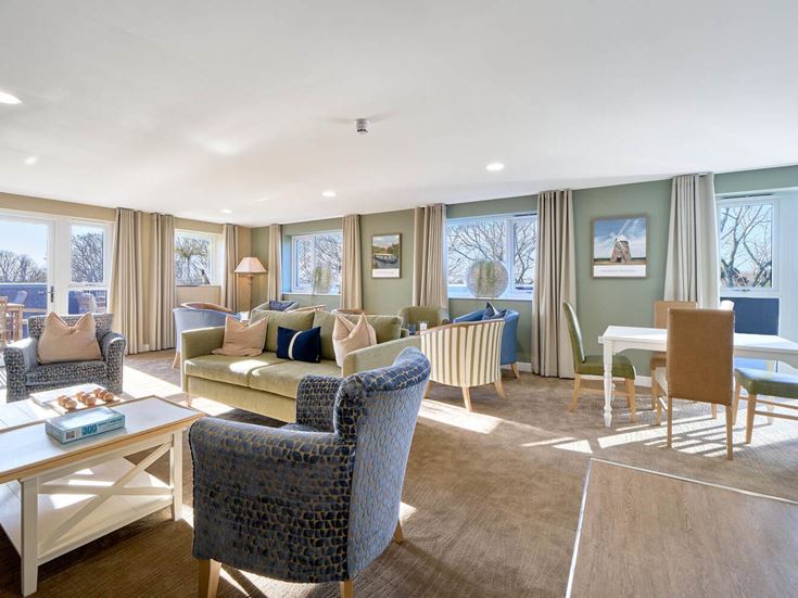 a large living room with a large window