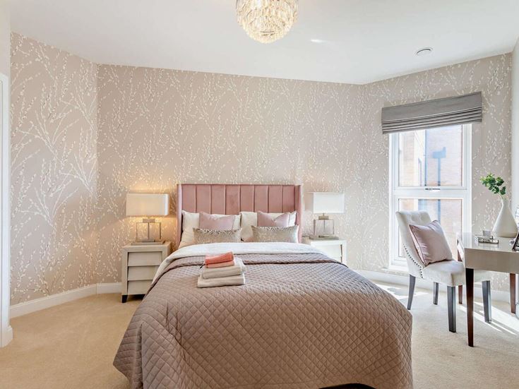a bedroom with a bed and a desk