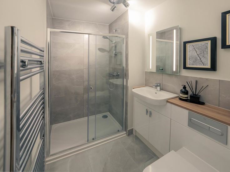 a bathroom with a glass shower