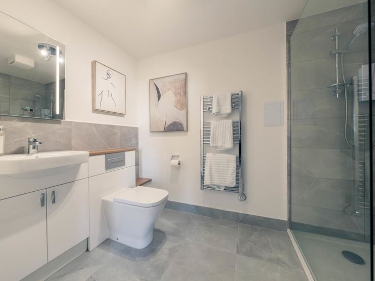 a bathroom with a glass shower