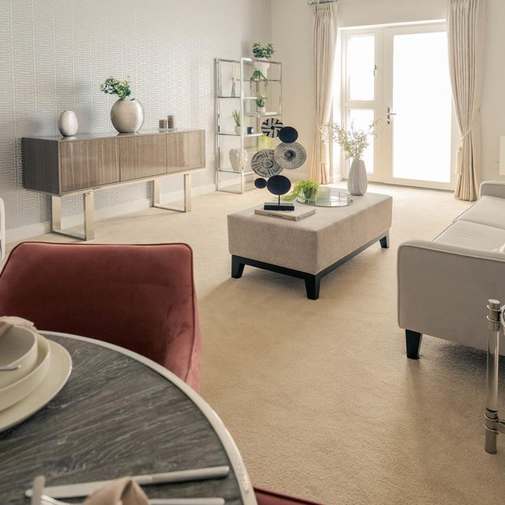 a living room with a couch and a table