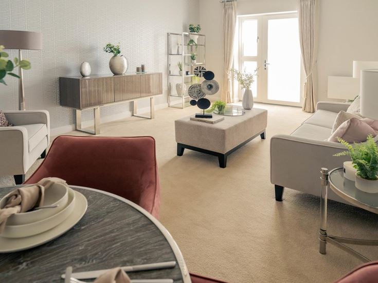 a living room with a couch and a table