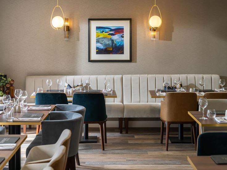 a room with tables and chairs