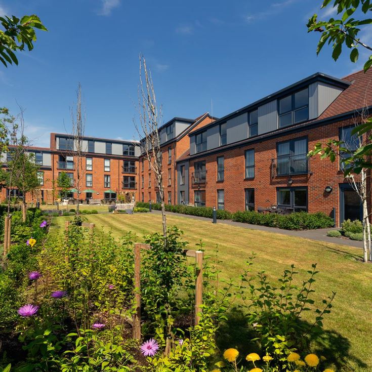 a garden in front of a building