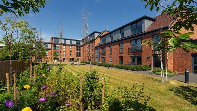 a garden in front of a building